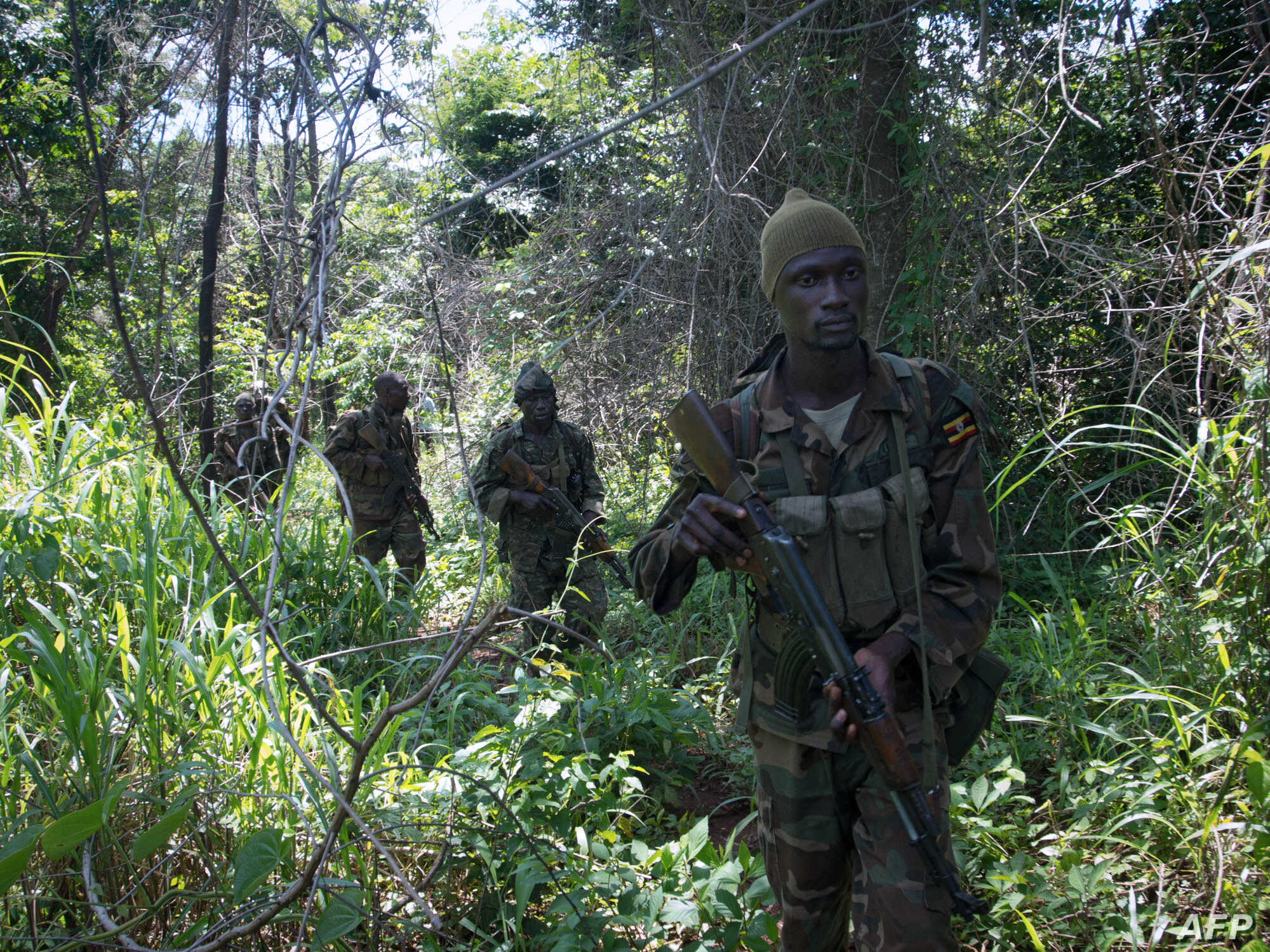 FILE - Soldiers of the Uganda People's Defence Force (UPDF) patrol in the jungle in the Central African Republic as they look for Lord's Resistance Army (LRA) fighters.