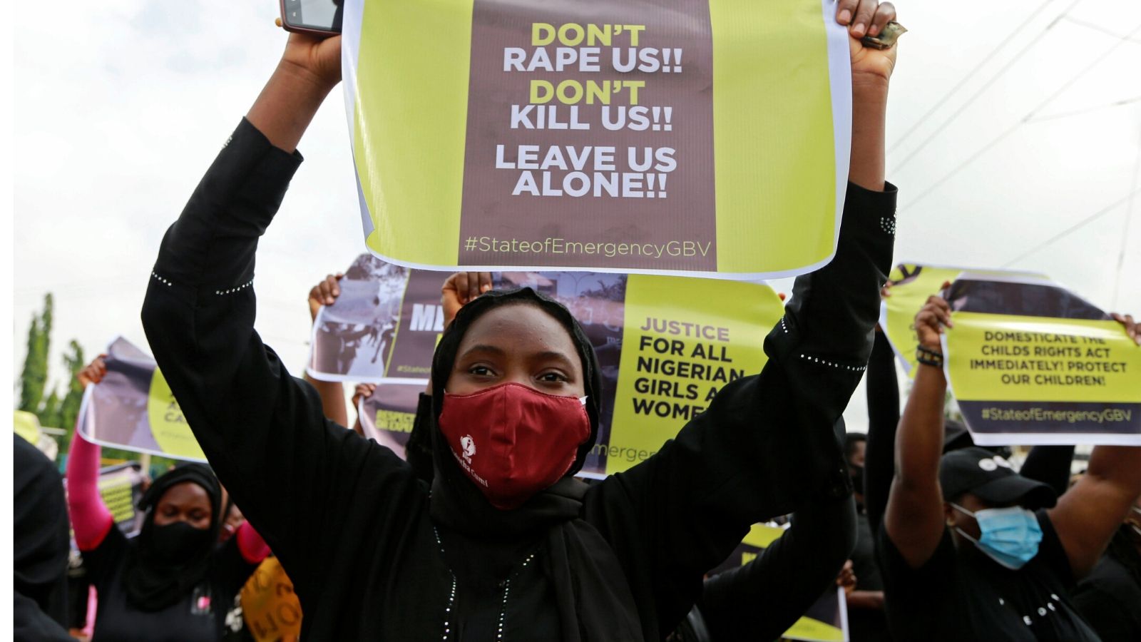 Protesters wearing face masks, carry banners as they stage a demonstration to raise awareness about sexual violence, in Abuja, Nigeria June 5, 2020. REUTERS/Afolabi Sotunde